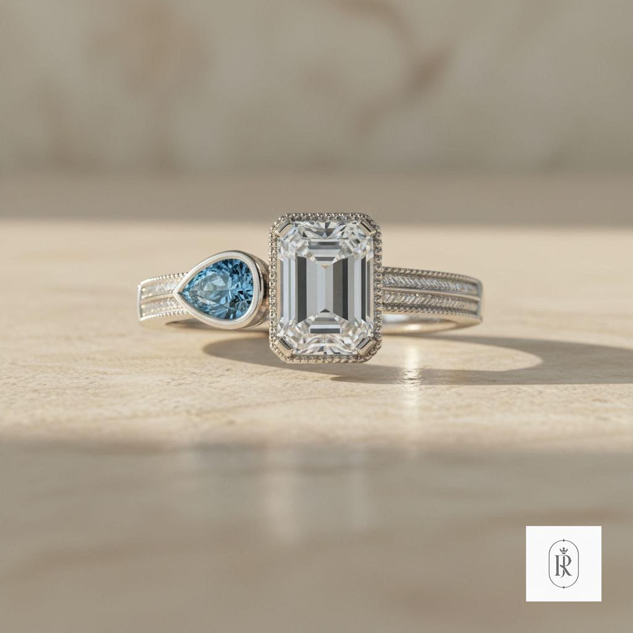 Unique Two Stone Engagement Ring: Emerald and Blue Pear Diamonds (14K Gold) — View 1 of custom handcrafted Lab Diamond jewellery in 14K White Gold
